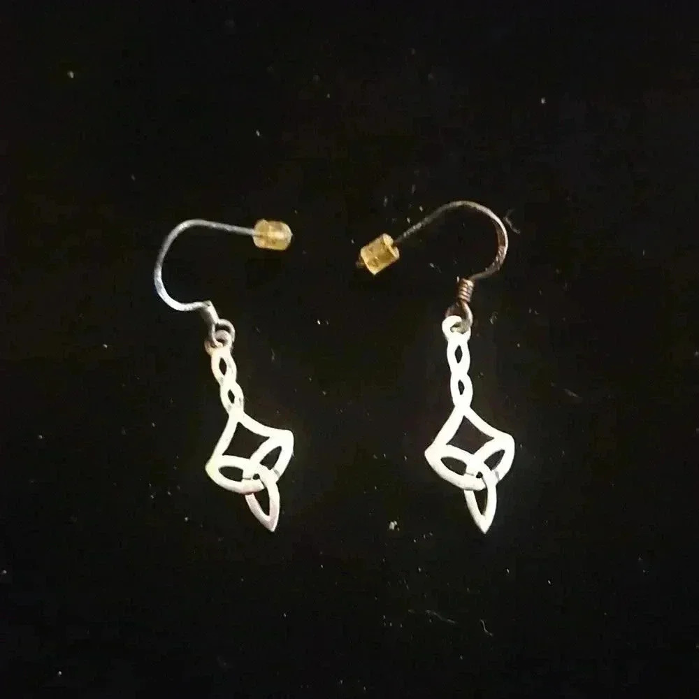 Sterling silver knotwork dangle earrings.